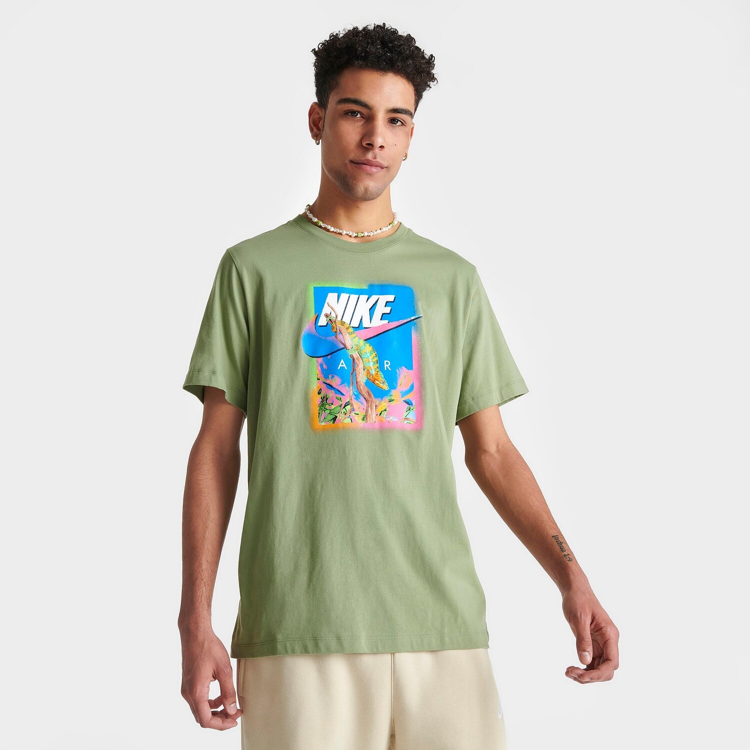 

Мужская футболка с рисунком хамелеона Nike Sportswear, зеленый