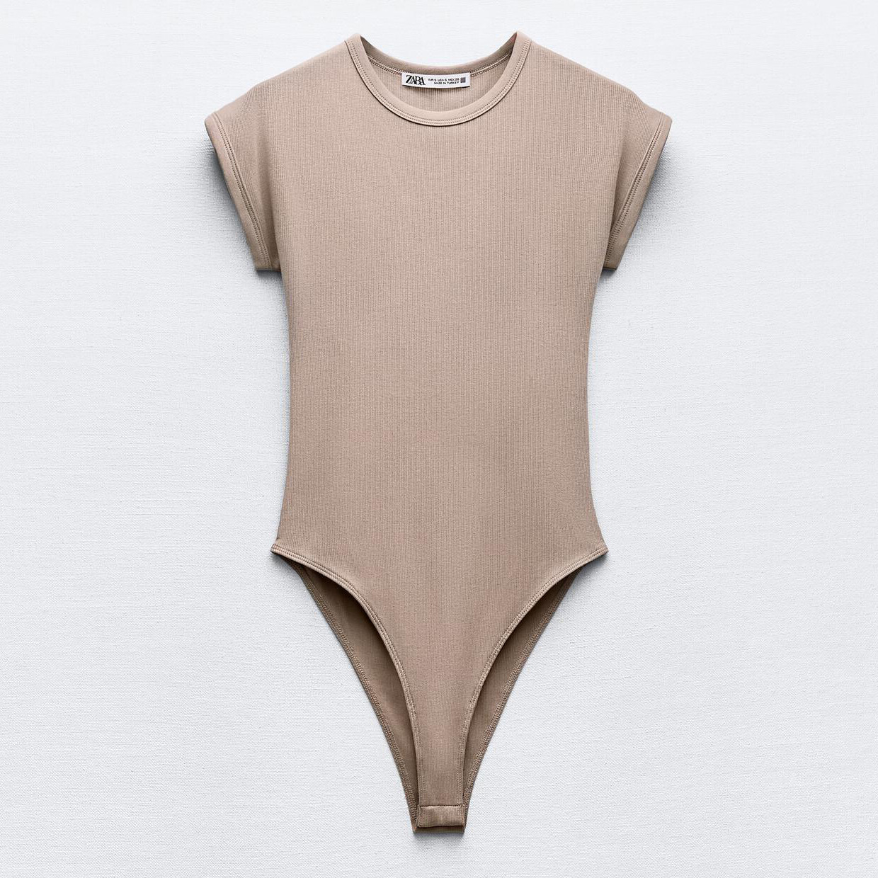 

Боди-комбинезон Zara Ribbed, бежево-розовый
