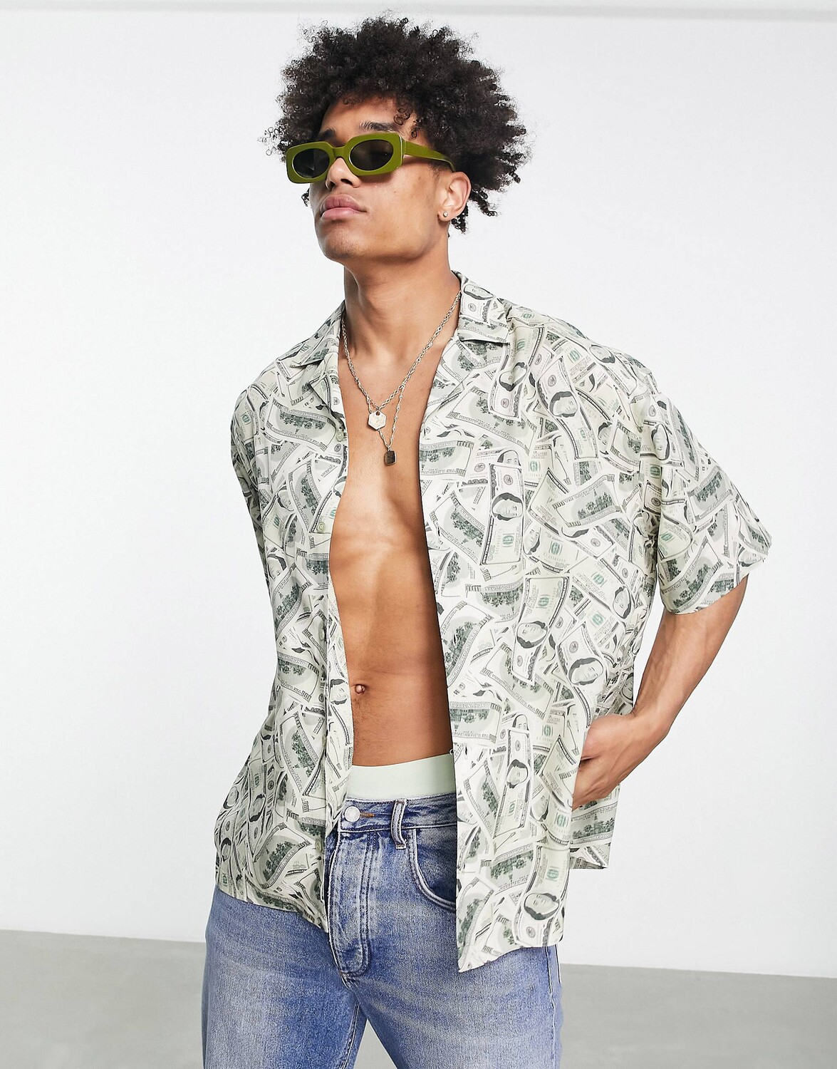 

Рубашка свободного кроя с принтом в виде денег ASOS DESIGN