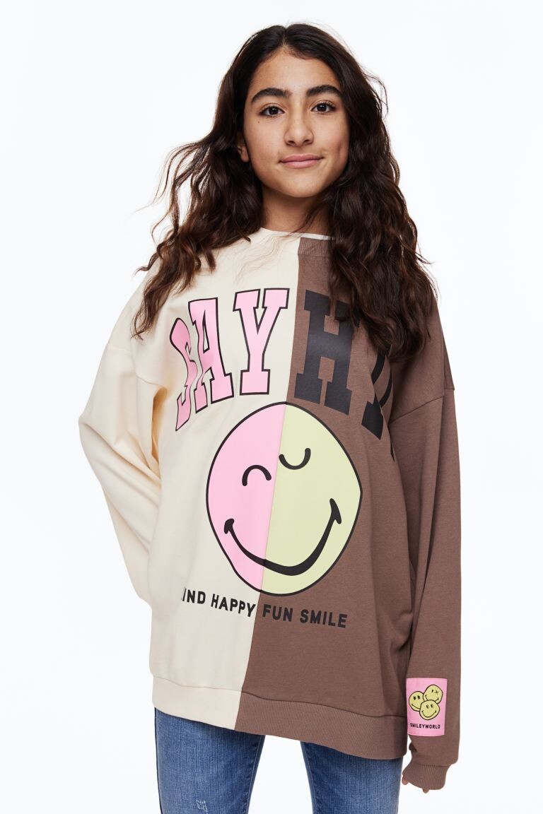 

Толстовка оверсайз с принтом H&M, крем/smileyworld