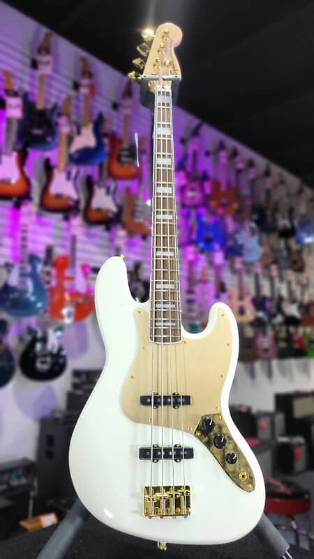 

Squier 40th Anniversary Gold Edition Jazz Bass - официальный дилер Olympic White *БЕСПЛАТНЫЙ PLEK ПРИ ПОКУПКЕ*!