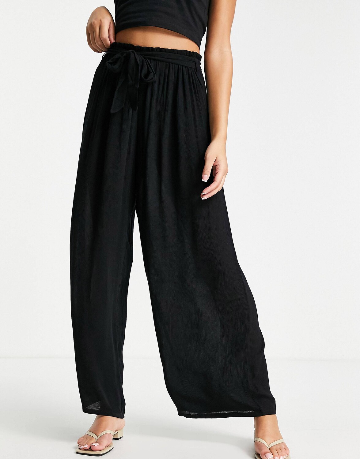 

Черные пляжные брюки палаццо с завязками на талии ASOS DESIGN, Черный