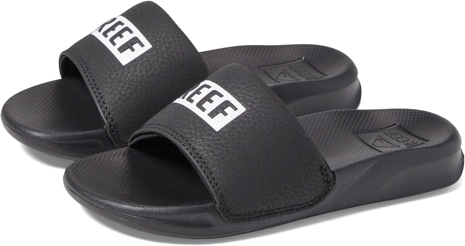 

Шлепанцы Reef Kids One Slide Sandal Reef, цвет Black/White
