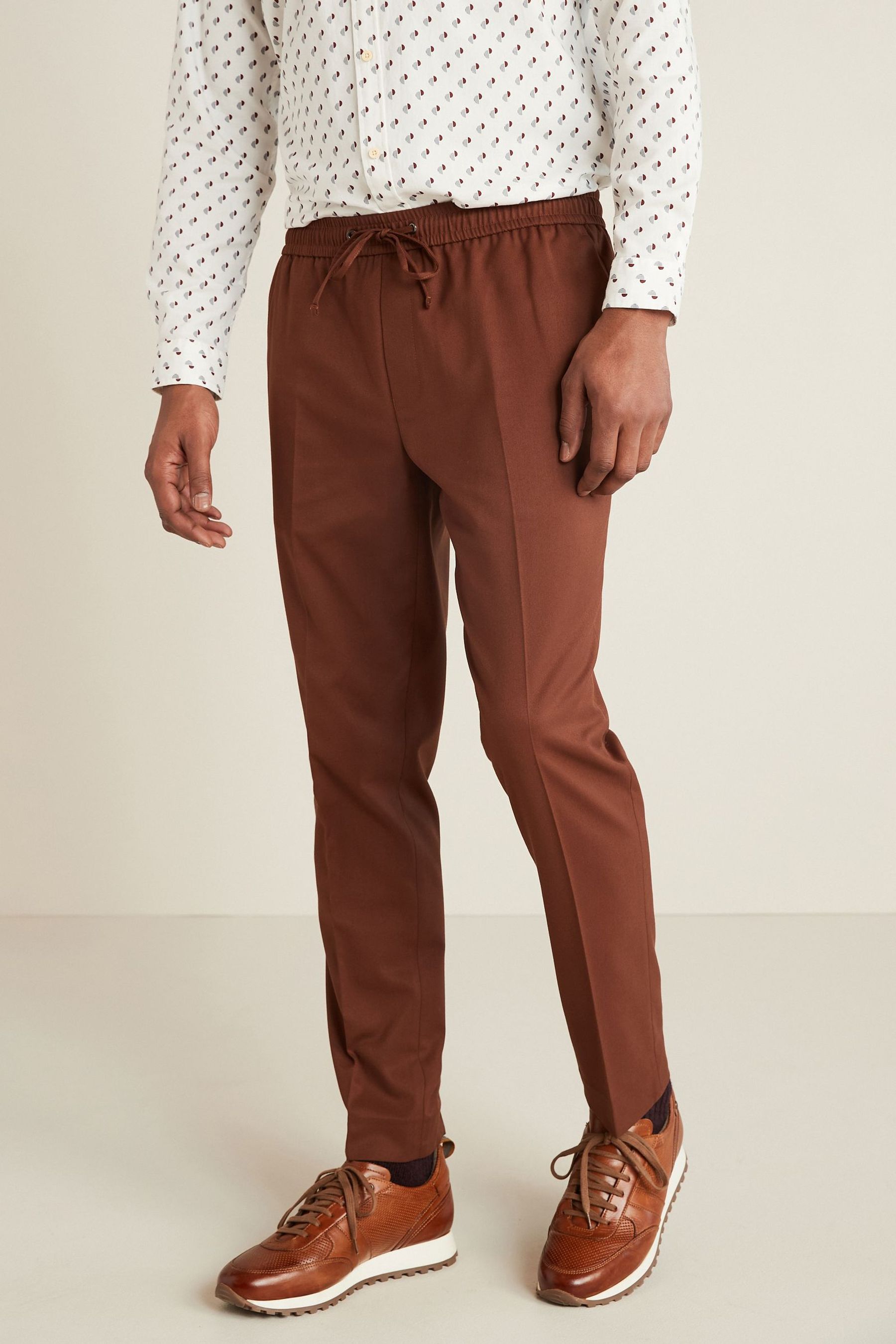 Эластичные строгие брюки Next, коричневый