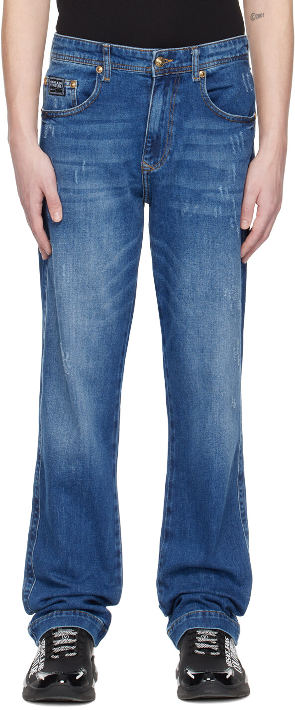 

Джинсы цвета индиго с эффектом потертости Versace Jeans Couture