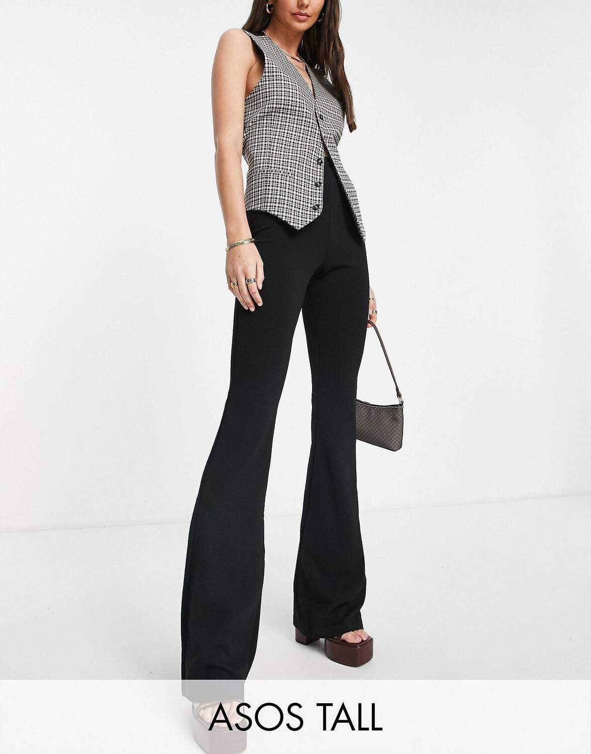 

Черные расклешенные брюки из джерси ASOS DESIGN Tall