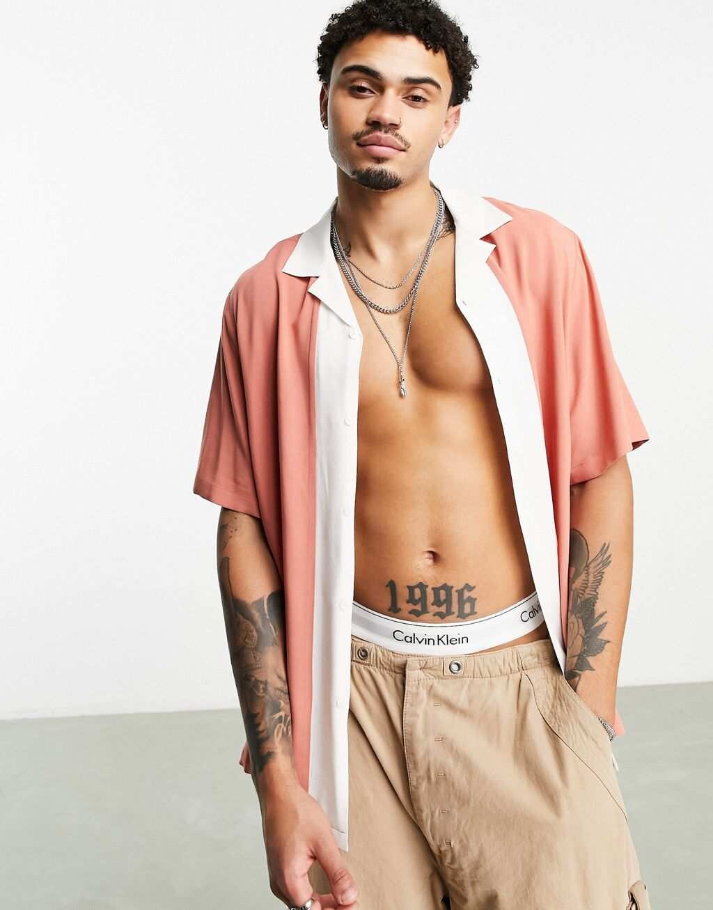

Свободная рубашка оранжевого кроя и пошива ASOS DESIGN Revere