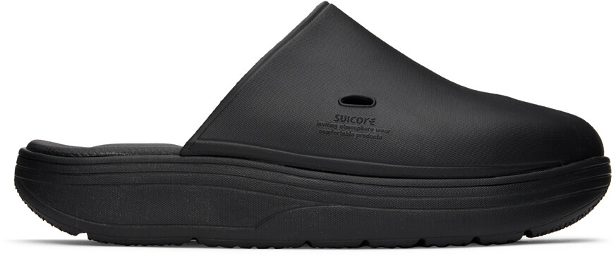 

Черные тапочки в горошек Suicoke