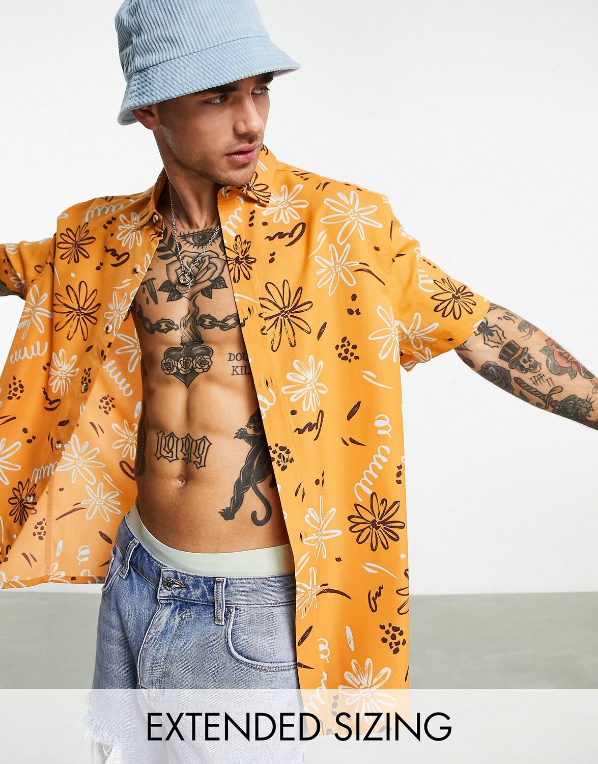 

Оранжевая рубашка свободного кроя с цветочным принтом ASOS DESIGN