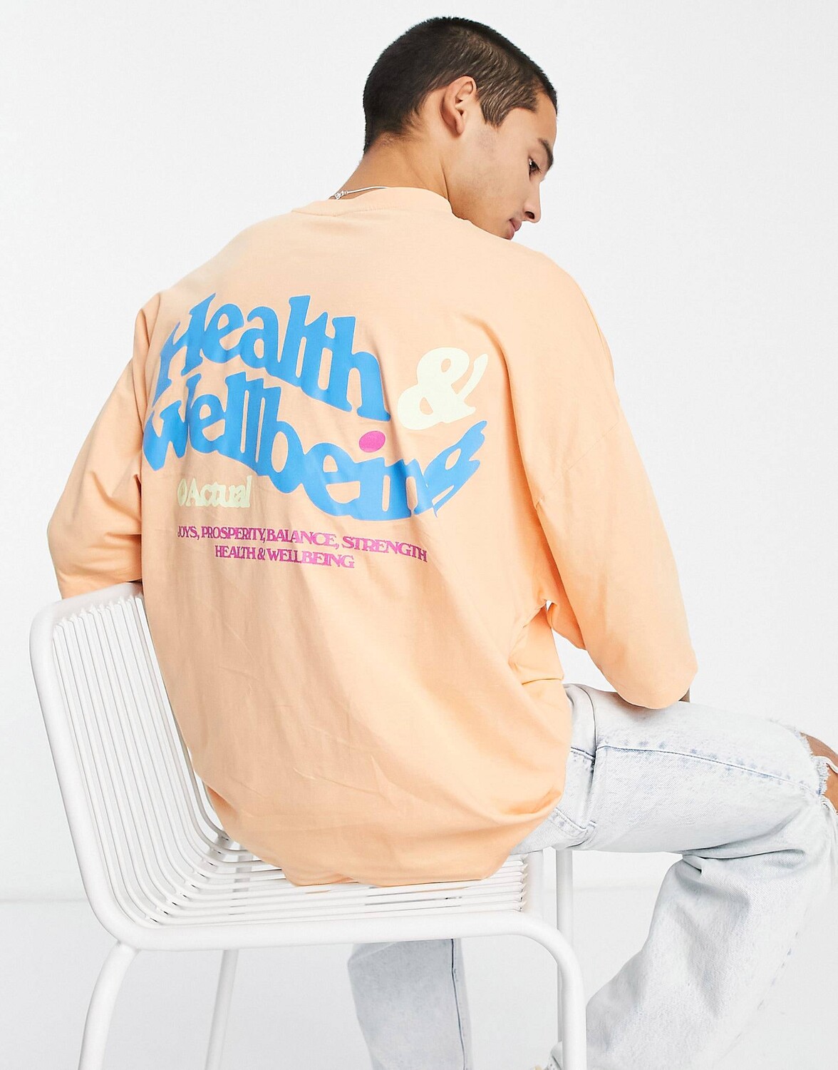 

Оранжевая футболка оверсайз с принтом Health & Wellbeing на спине ASOS Actual