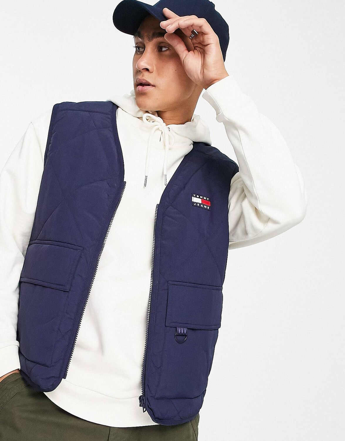 

Темно-синий стеганый жилет эксклюзивной капсульной коллекции Tommy Jeans ASOS