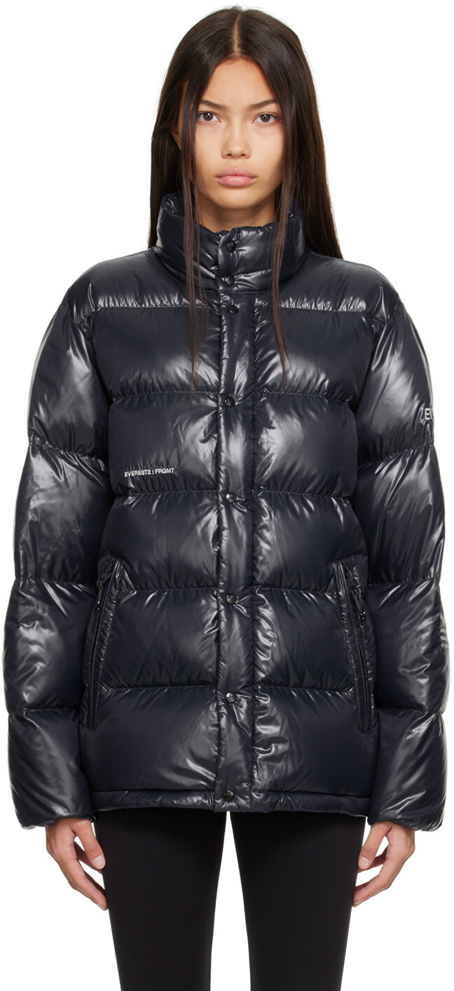 

Темно-синий пуховик с вышивкой Moncler Genius