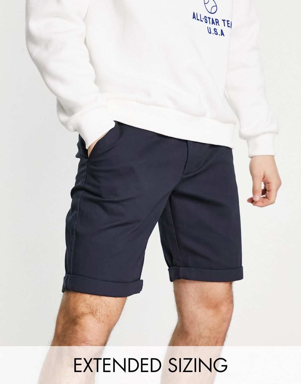 

Темно-синие узкие шорты чинос средней длины ASOS DESIGN