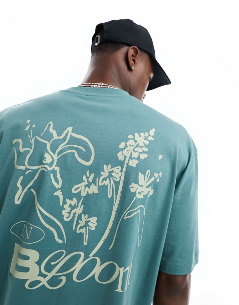 

Зеленая футболка оверсайз с цветочным принтом на спине ASOS DESIGN