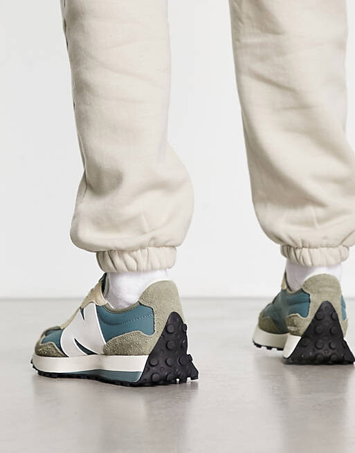 

Кроссовки New Balance 327 серого и голубого цветов.