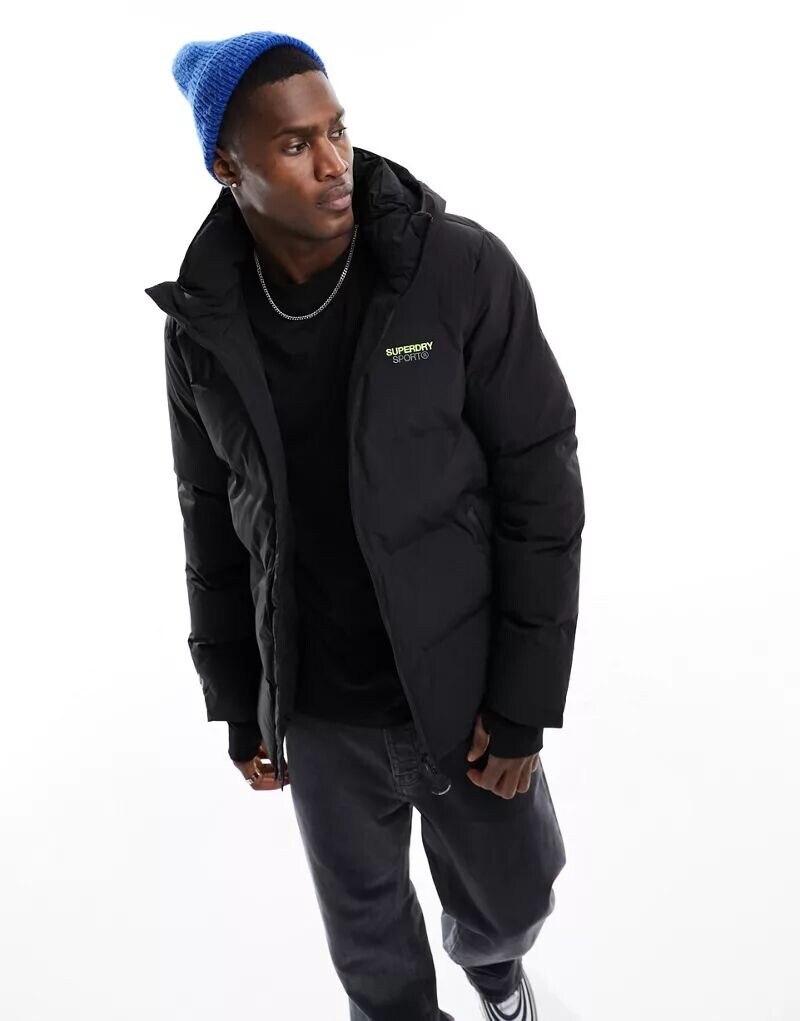 

Черная стеганая куртка свободного кроя с капюшоном Superdry