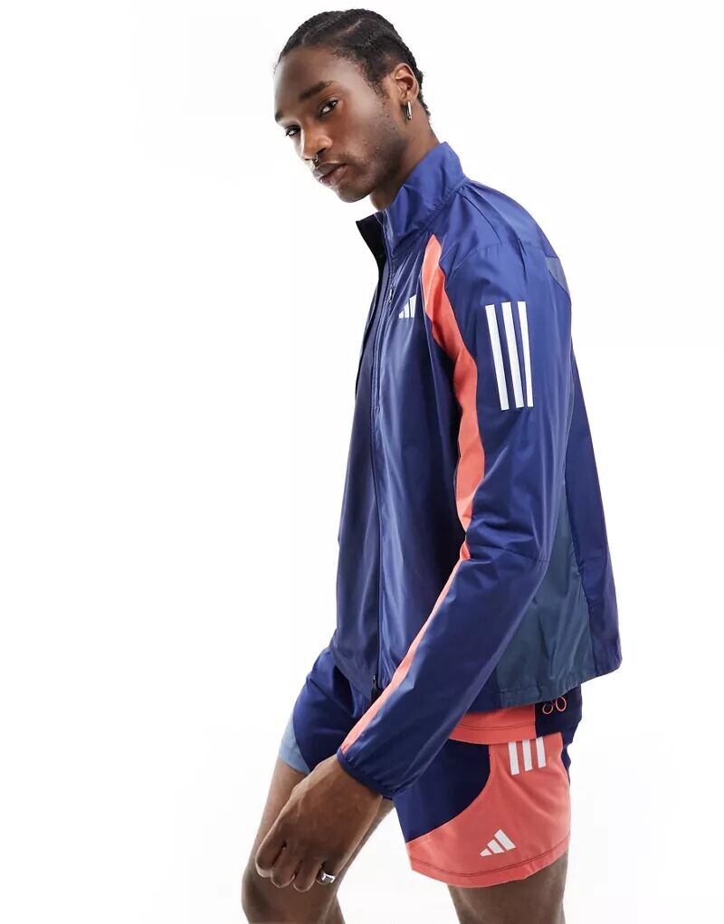 

Темно-синяя и оранжевая куртка adidas Running Own The Run adidas performance