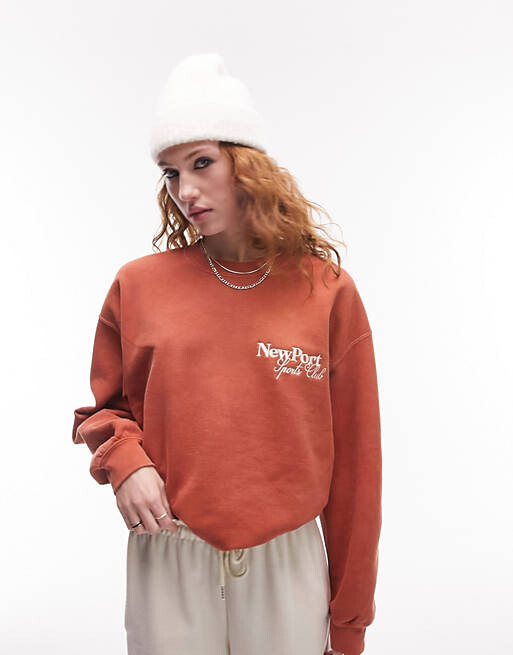 

Оранжевые спортивные штаны Topshop с графическим принтом New Port Vintage