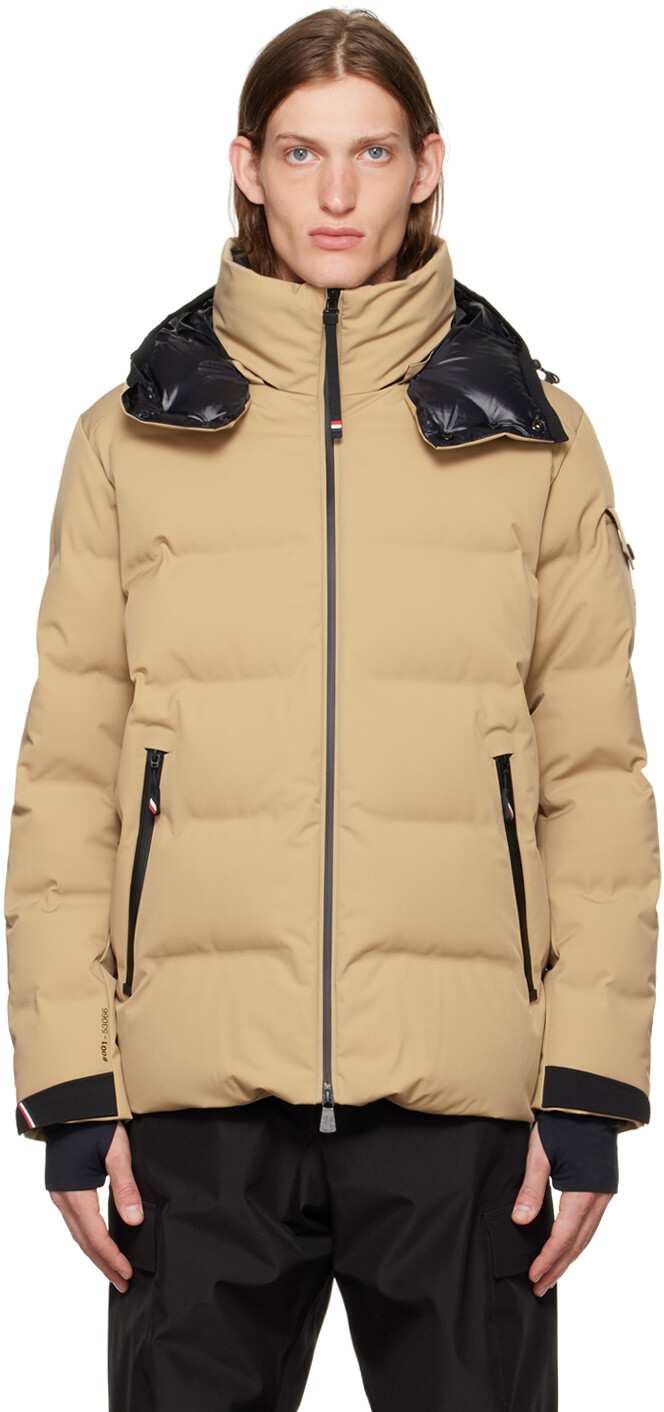 

Бежевый пуховик с нашивками Moncler Grenoble