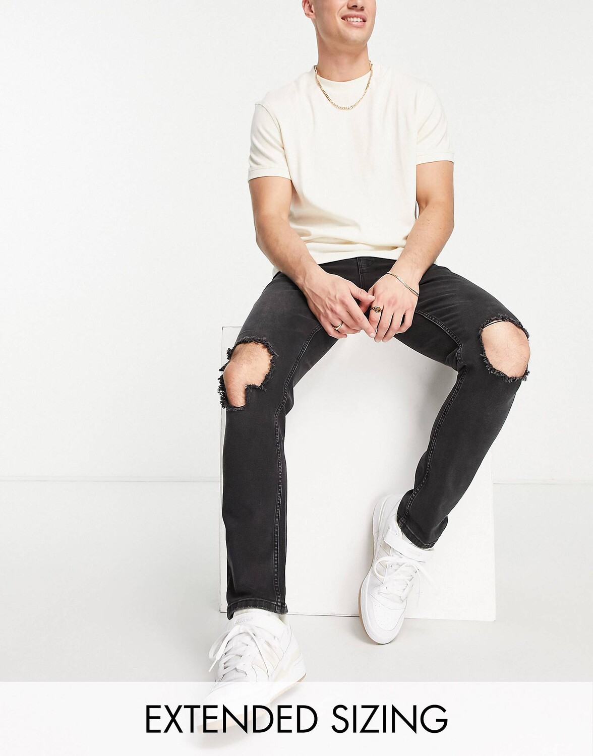 

Черные джинсы скинни стрейч с прорезями на коленях ASOS DESIGN