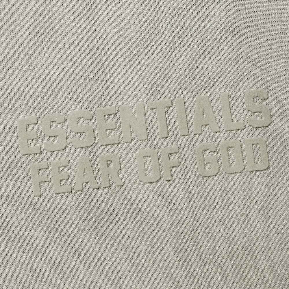 

Толстовка Fear of God ESSENTIALS Logo Crew Neck Sweat