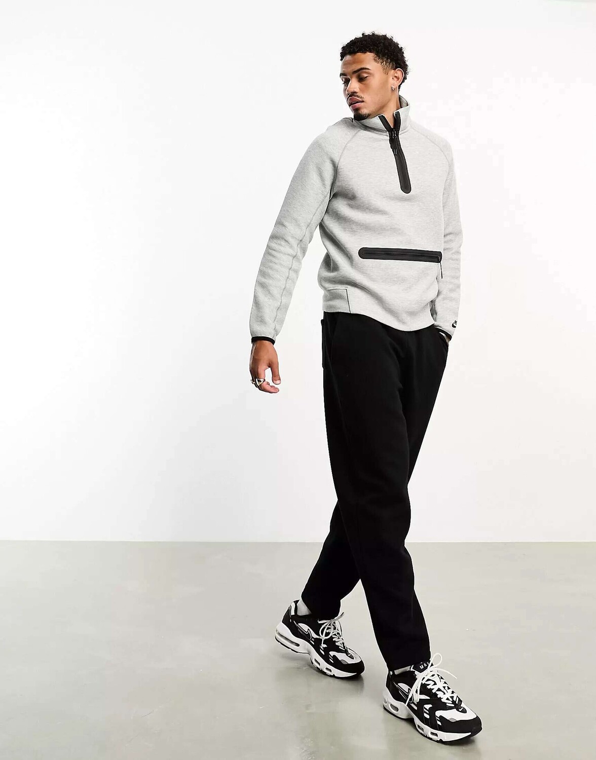 

Серый флисовый топ Nike Tech Fleece с полумолнией