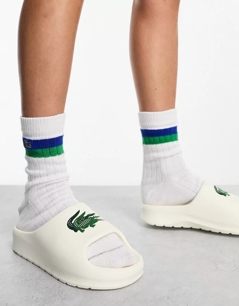 

Белые шлепанцы Lacoste Serve 2.0