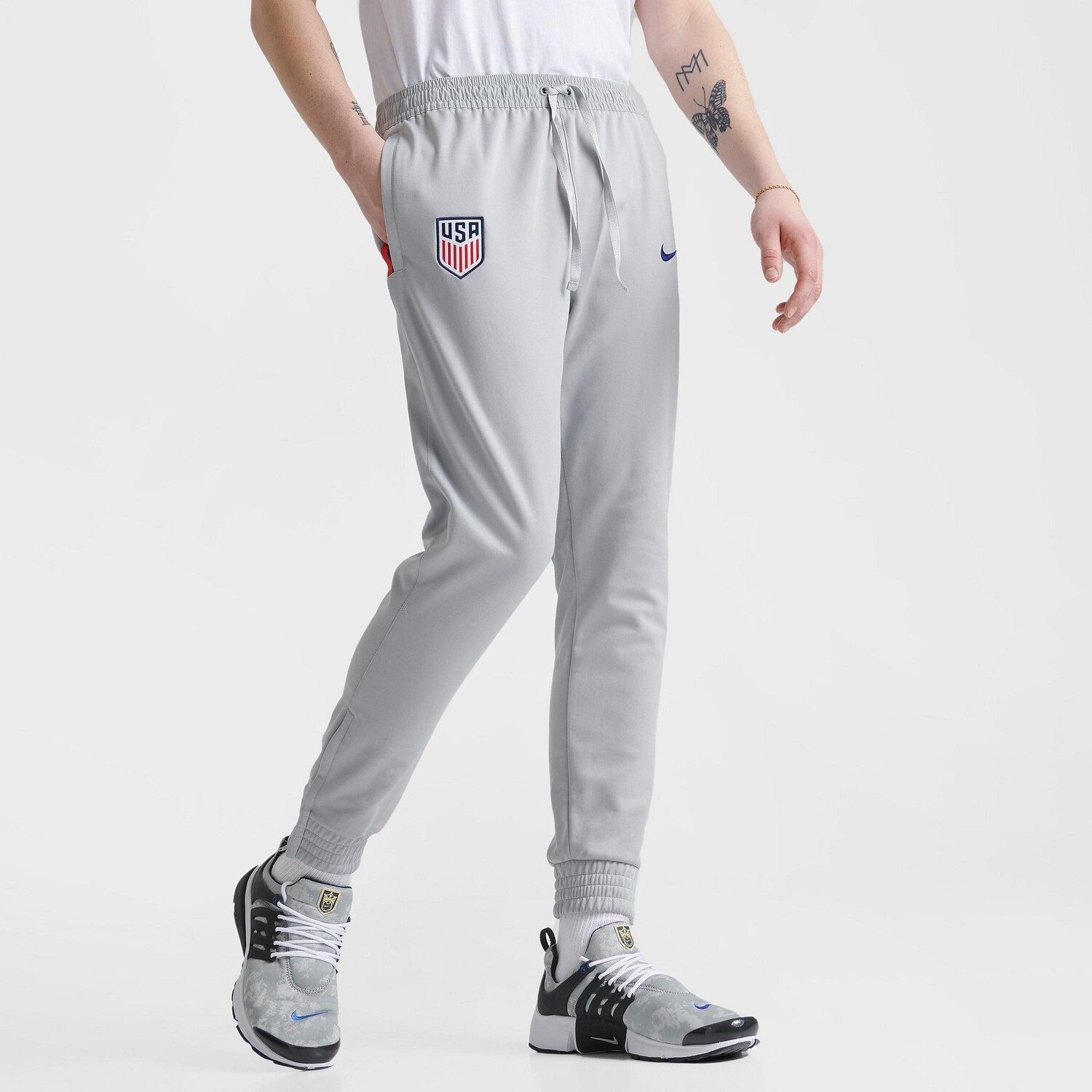 

Мужские футбольные трикотажные брюки Nike Sportswear U.S., серый