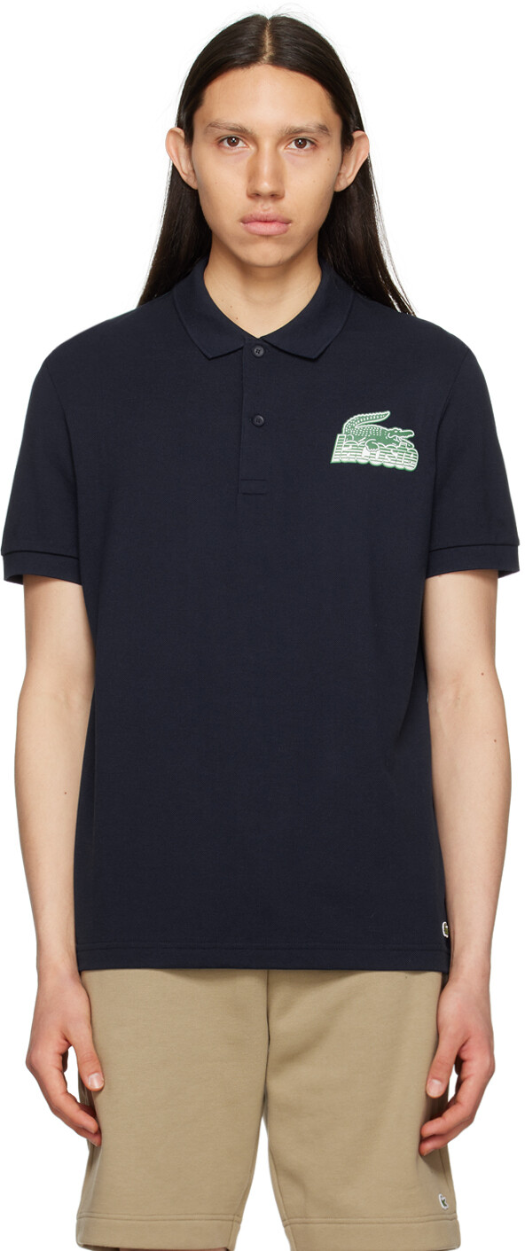 

Поло темно-синего цвета Lacoste