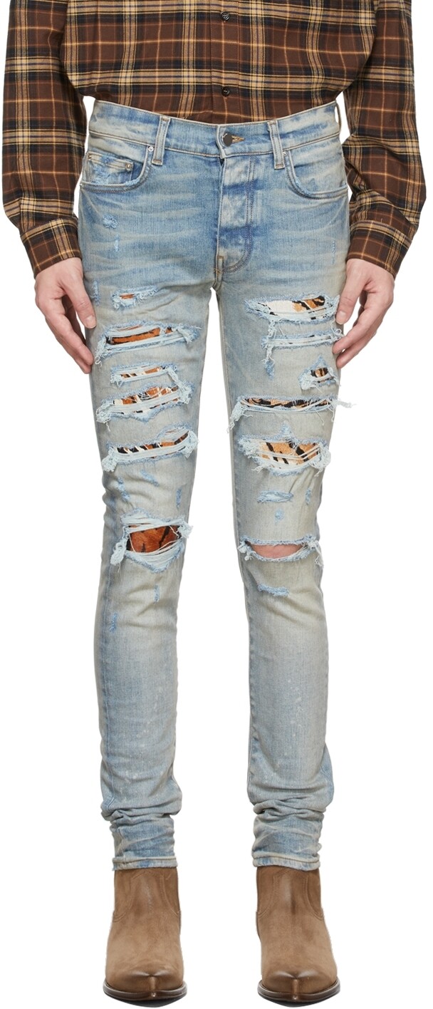 

Синие джинсы Thrasher с лунным Новым годом Amiri