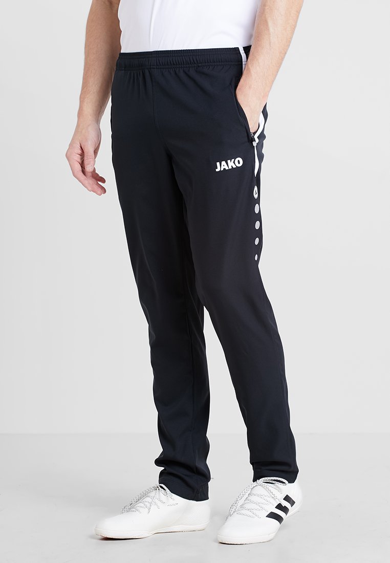 Спортивные брюки Striker JAKO, цвет schwarz/weiß