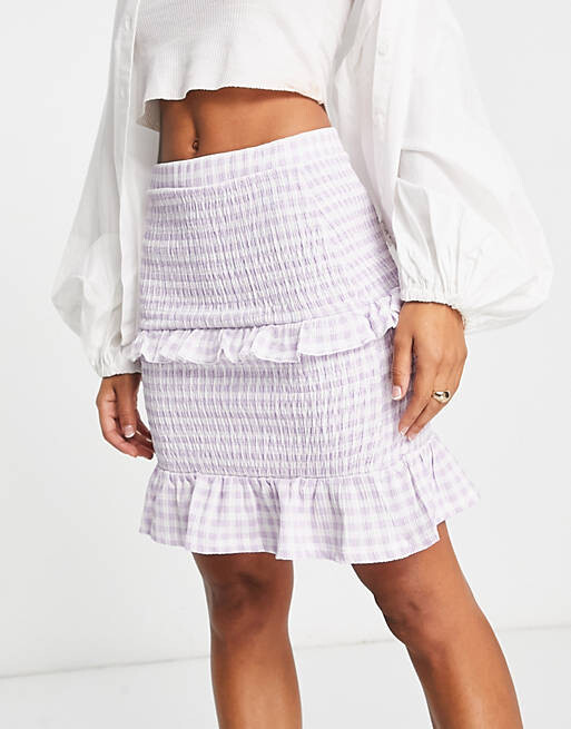 

Сиреневая мини-юбка в клетку с оборками River Island