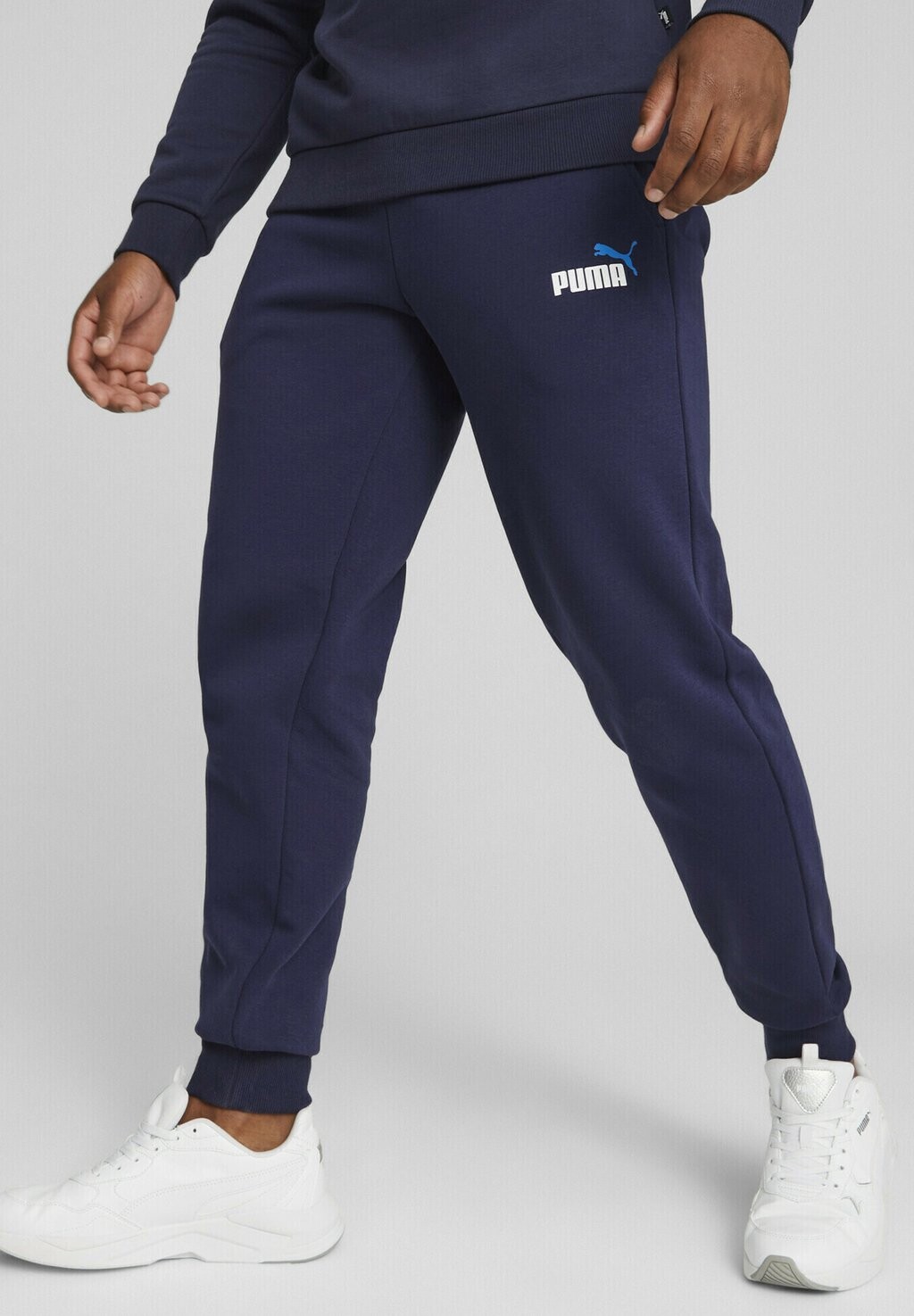 

Спортивные брюки ESSENTIALS+ MIT ZWEIFARBIGEM LOGO Puma, темно-синие