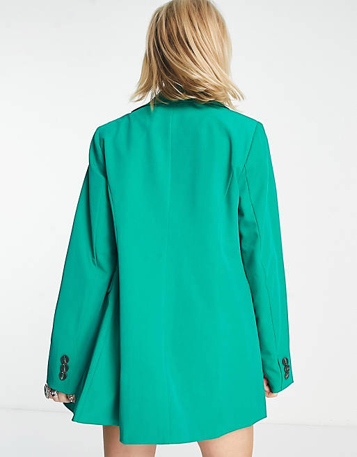 Только двубортный пиджак ярко-зеленого цвета