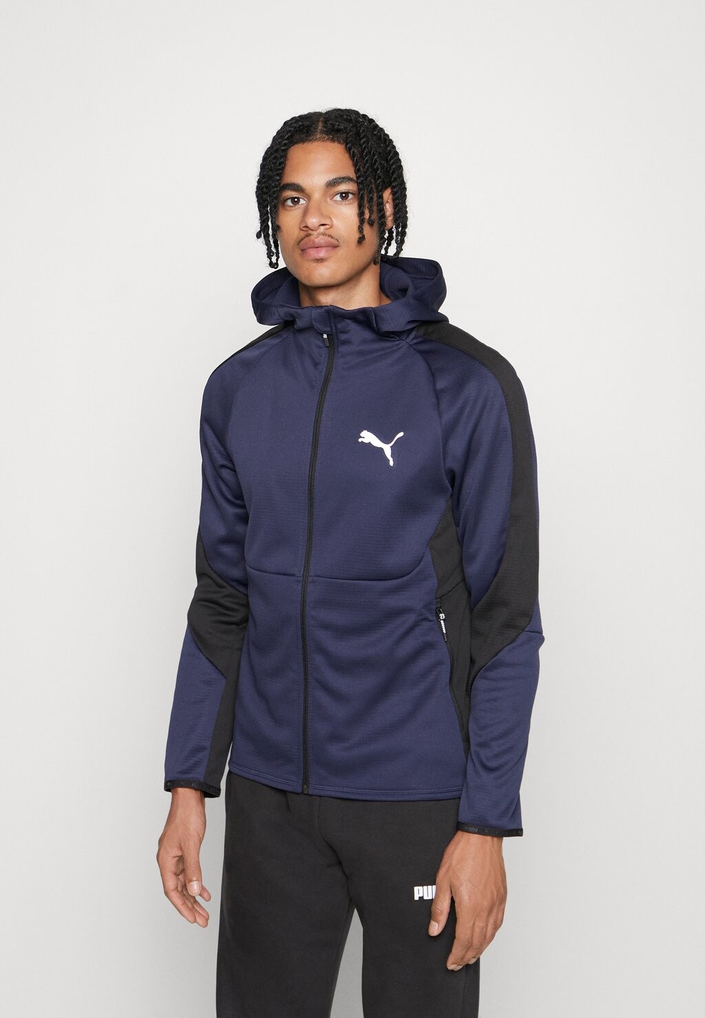 

Спортивная куртка EVOSTRIPE WARM HOODIE Puma, темно-синий