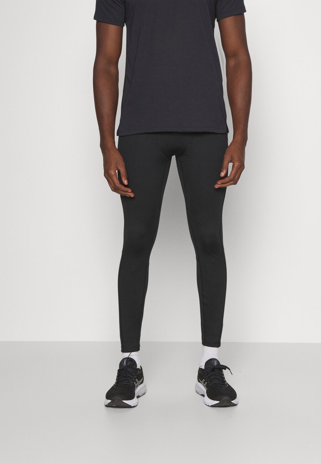 

Тайтсы Run Base Layer Reebok, черный