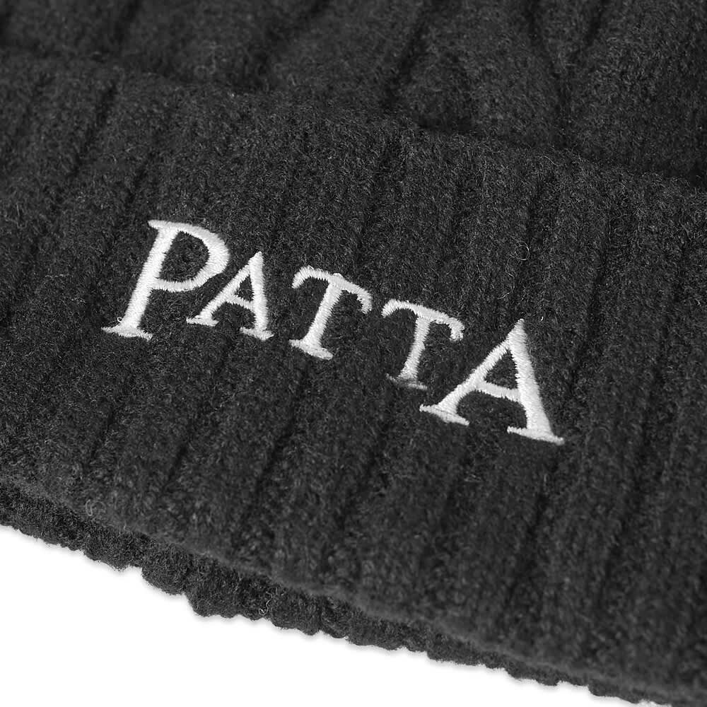 

Вязаная шапка с косами Patta