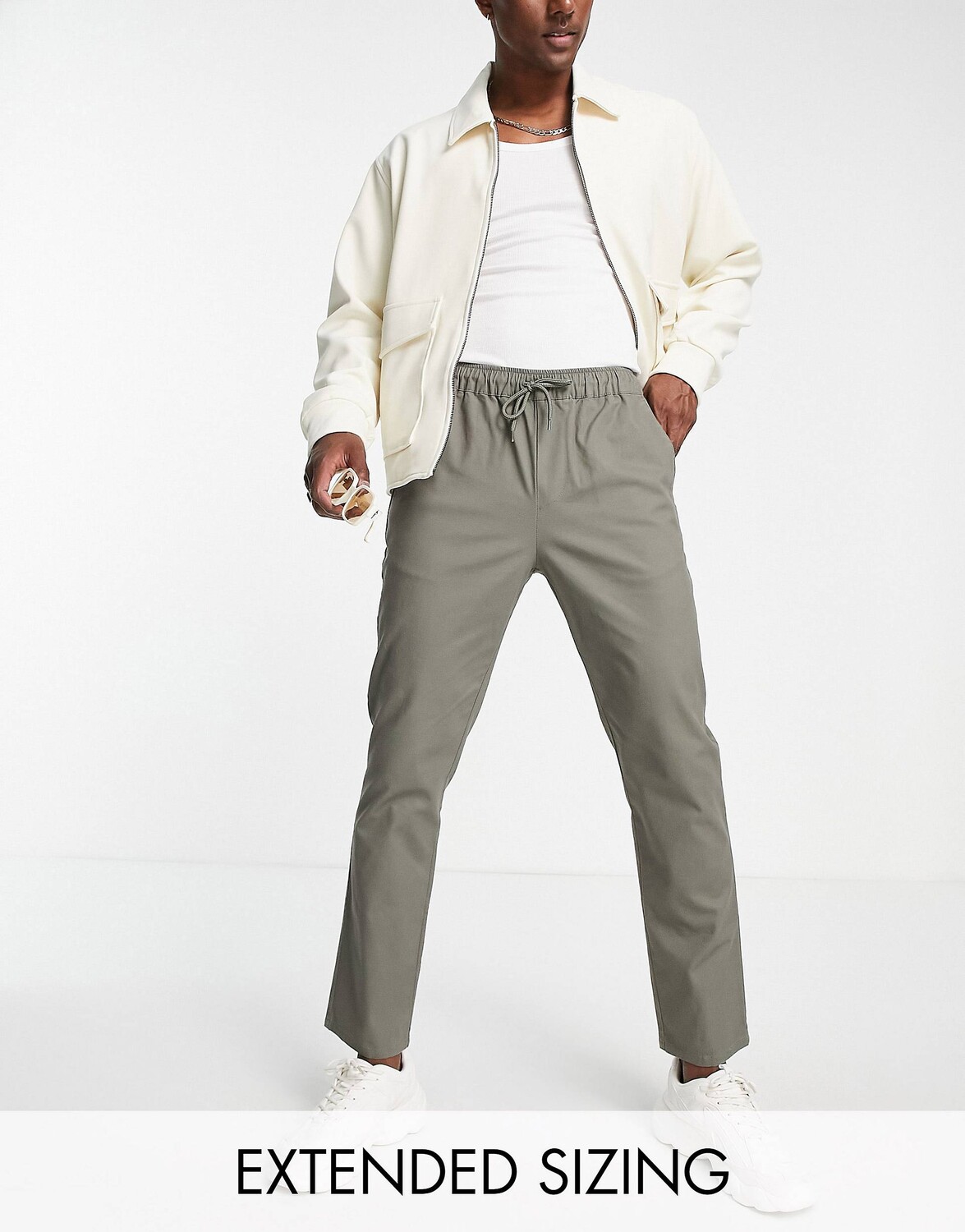 

Узкие брюки чинос цвета хаки с эластичной талией ASOS DESIGN