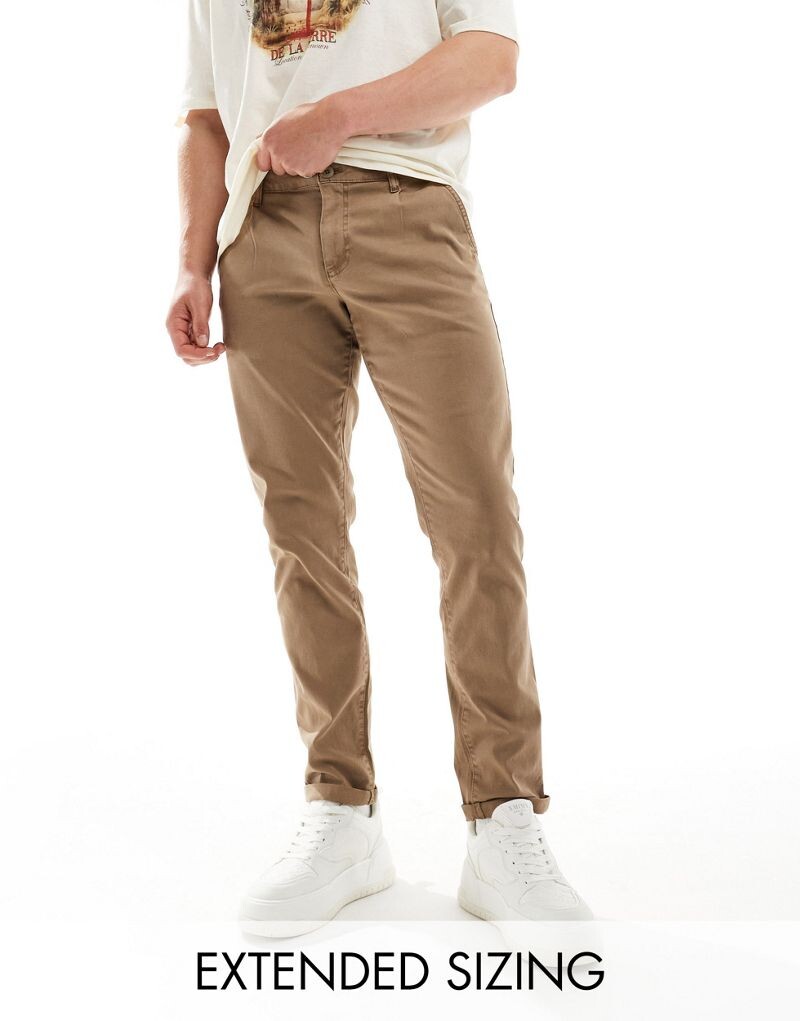 

ASOS DESIGN — узкие чиносы бежевого цвета с эффектом потертости