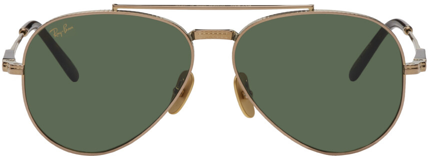 

Золотые солнцезащитные очки-авиаторы II Ray-Ban