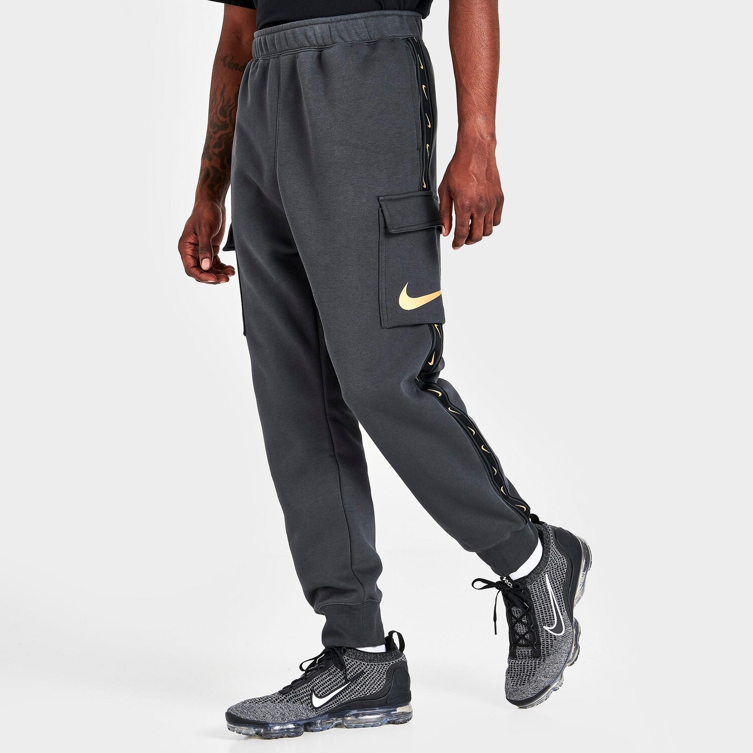

Флисовые брюки-джоггеры Nike Sportswear с повторяющейся тесьмой, серый