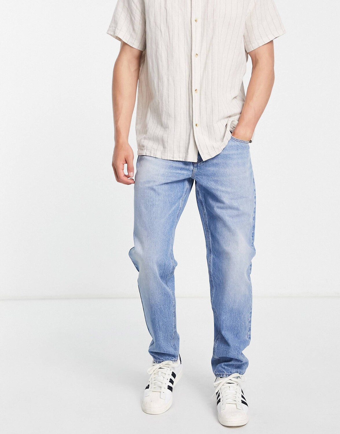 

Светло-голубые зауженные джинсы ASOS DESIGN