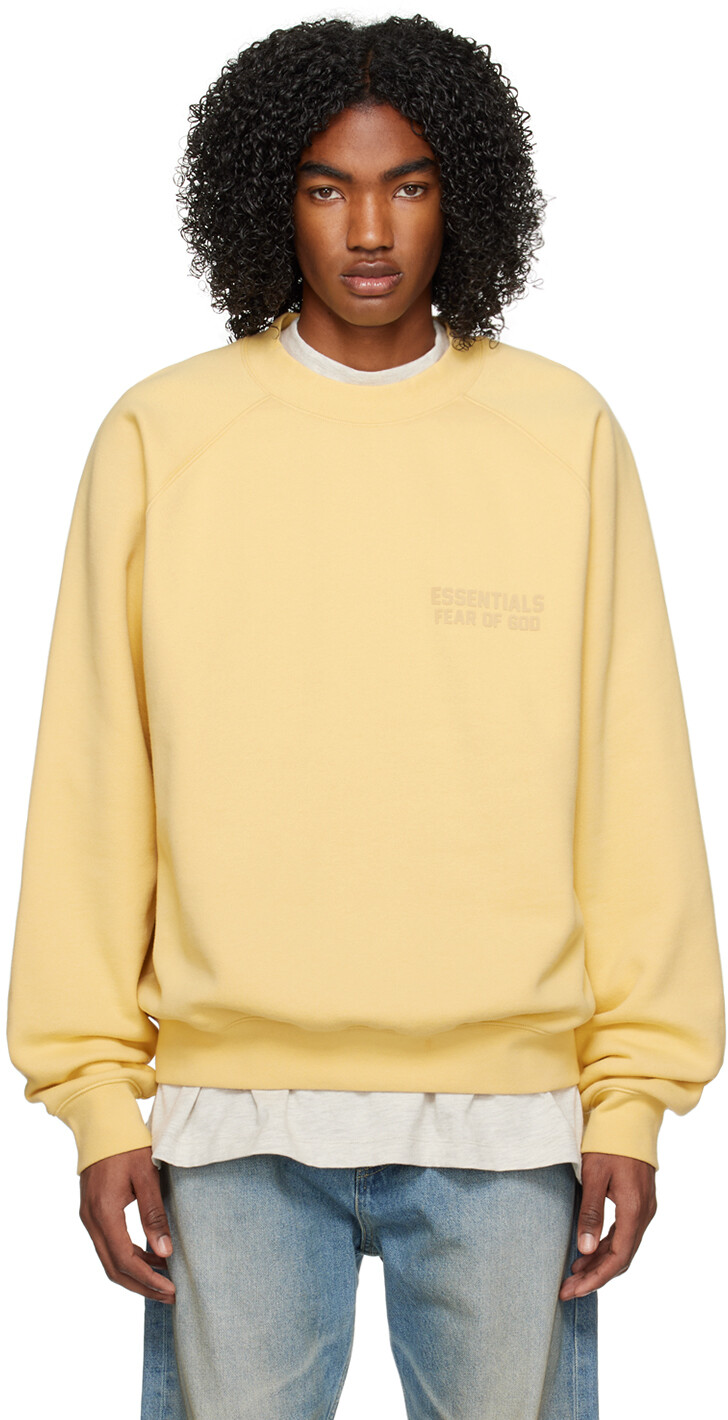 

Желтый свитшот реглан Fear of God ESSENTIALS