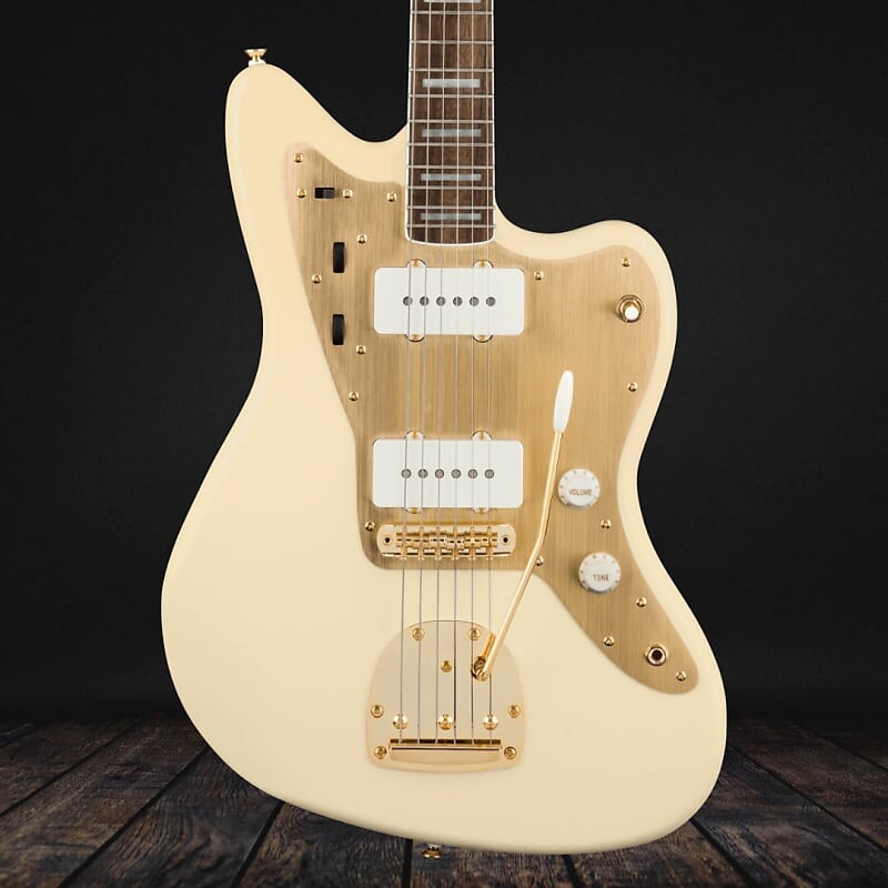 

Squier 40th Anniversary Jazzmaster, Gold Edition, накладка на гриф Laurel — золотая анодированная накладка — олимпийский белый 40th Anniversary Jazzmaster, Gold Edition, Laurel Fingerboard- Gold Anodized Pickguard- (Coming Soon)