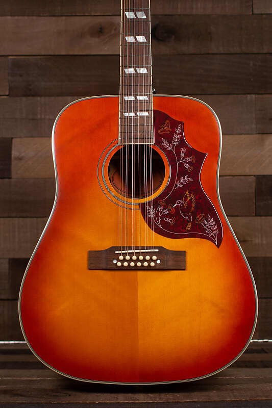 

Epiphone Hummingbird 12-String Inspired Gibson, Solid Top, Aged Cherry Sunburst Gloss Hummingbird String Inspired by Gibson Solid Top Aged Cherry S...