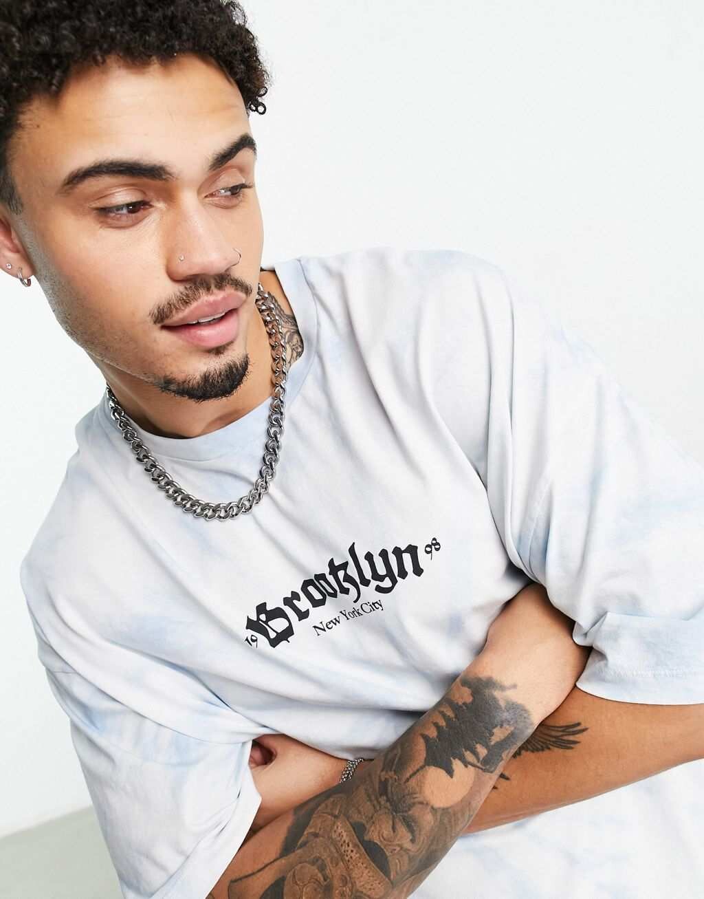 

Синяя футболка оверсайз с готическим текстовым принтом на груди ASOS DESIGN, Синий