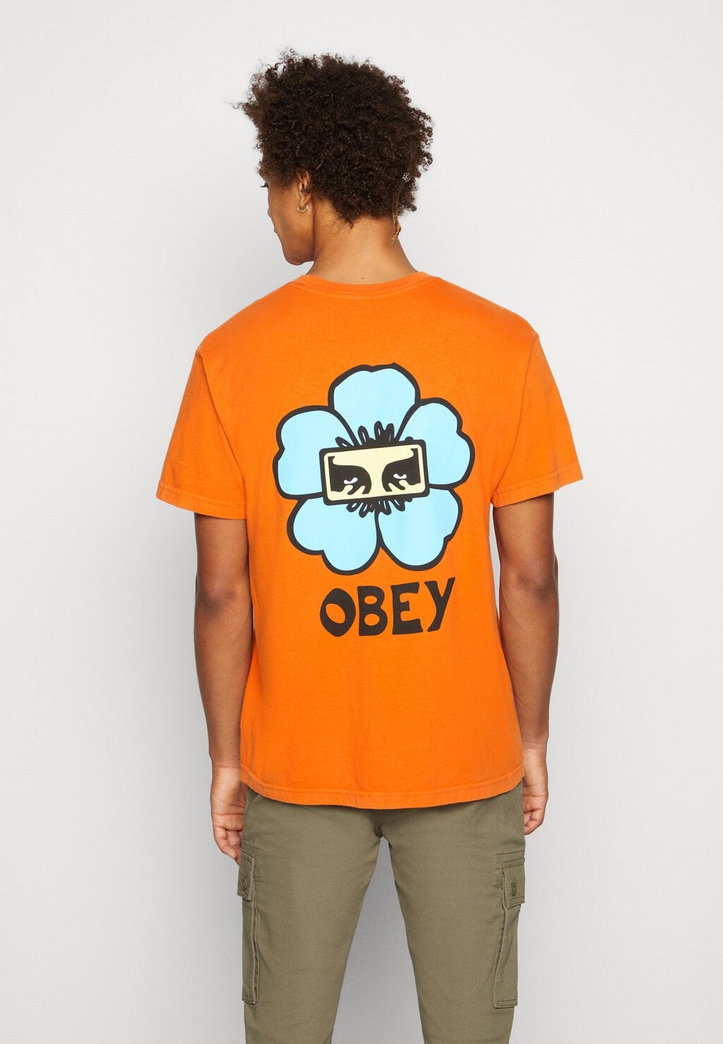 

Футболка с принтом Obey Clothing, оранжевый