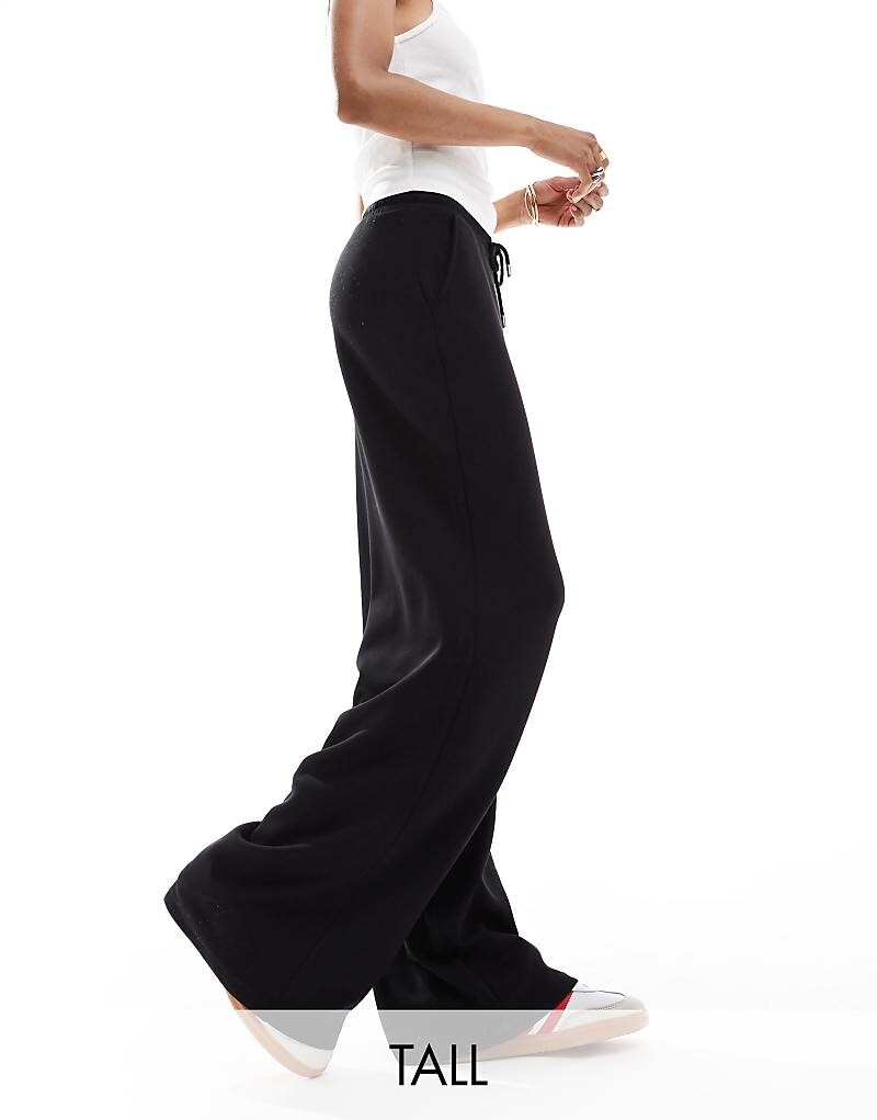 

Черные джоггеры Stradivarius Tall, мягкие на ощупь и широкие