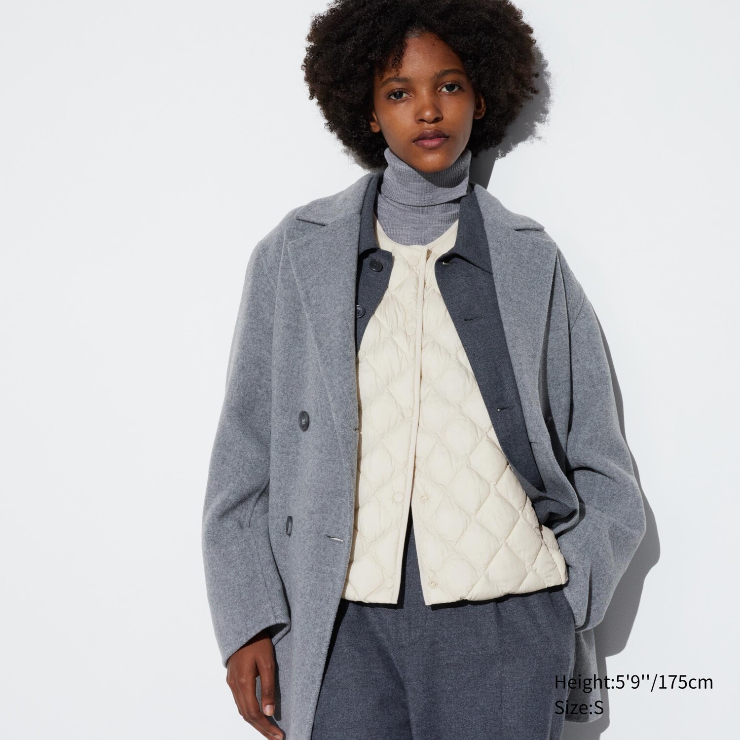 

Теплый жилет UNIQLO, белая кость