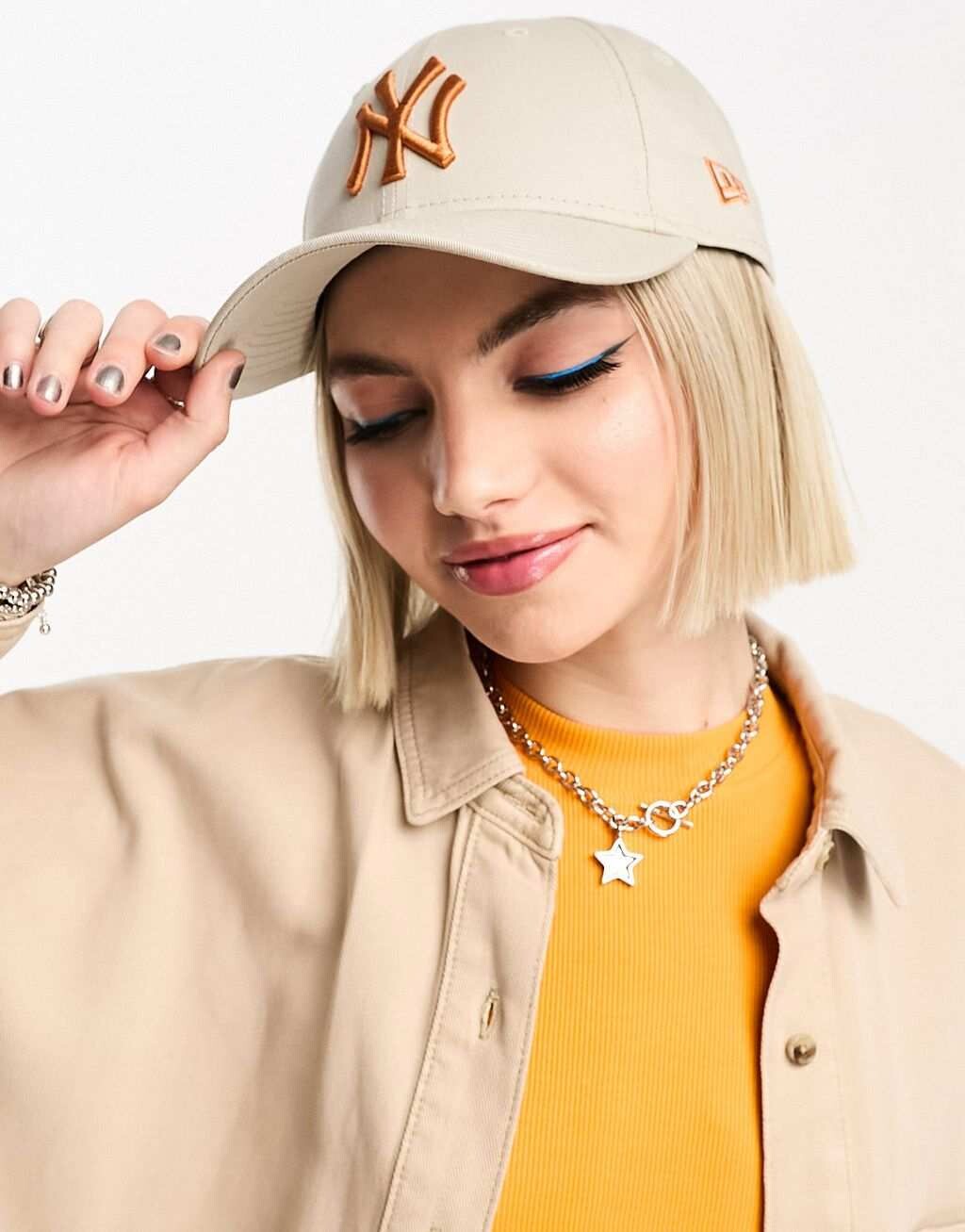 

Бежевая кепка New Era 9Forty NY